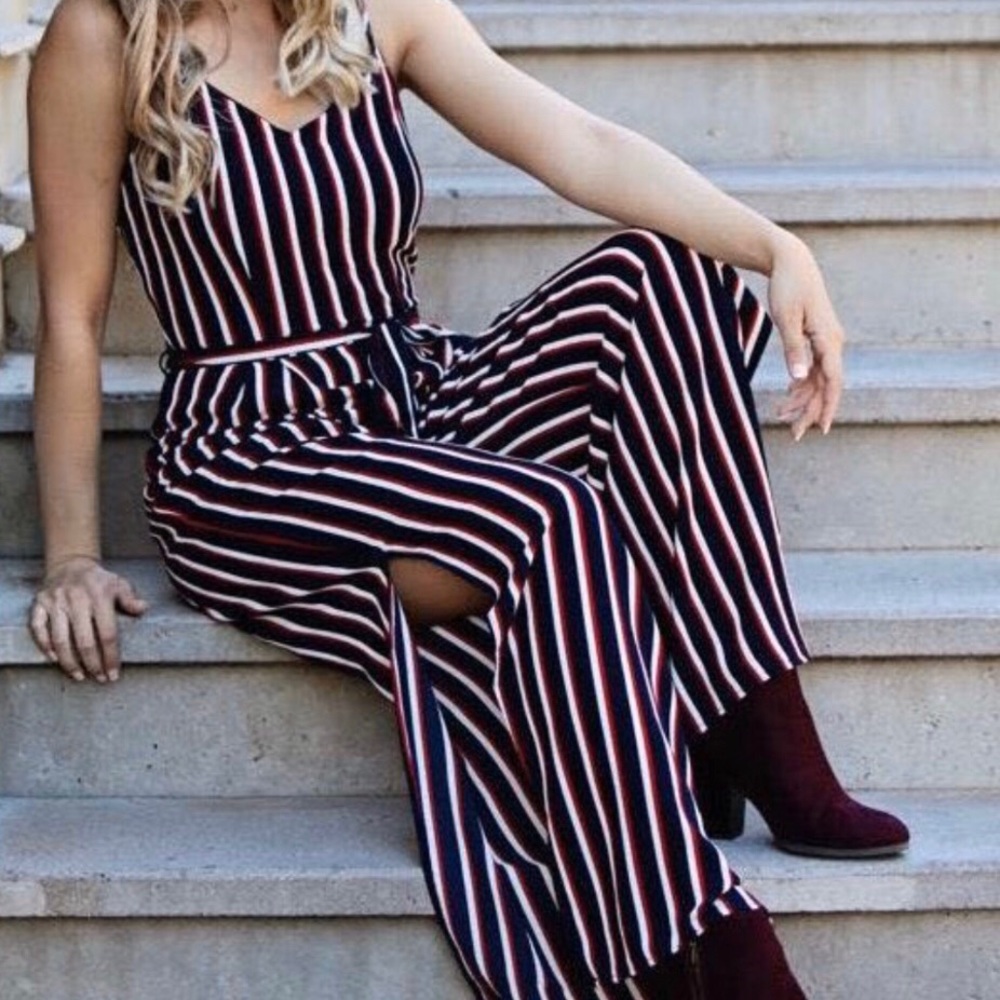 Striped jumpsuit w/ waist tie & side leg slits. size large. Excellent condition
